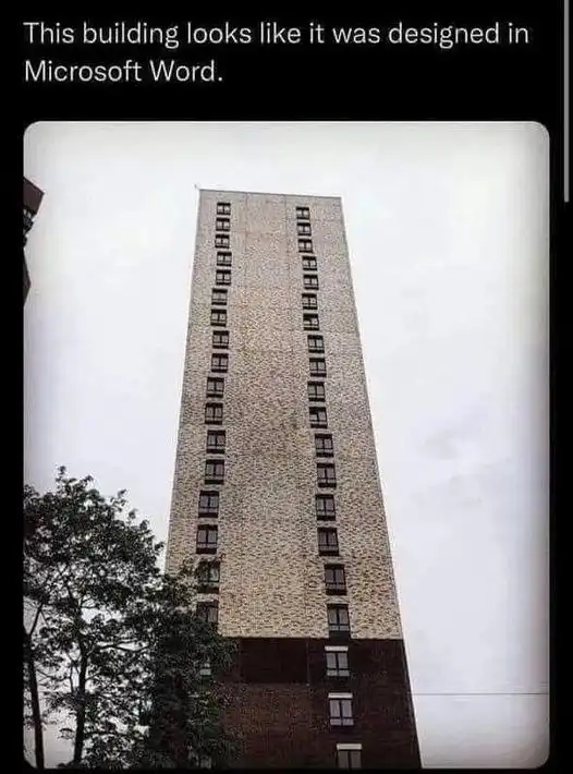 Apartment uilding Looks Like It Was Designed In Microsoft Word. It's about 24-stories tall and has two windows on each floor, but the windows do not line up with the windows that are above or below them